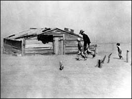 A farmer and his two sons during a dust storm in Cimarron County, Oklahoma, 1936.