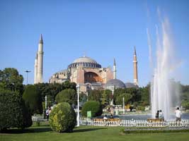 Exterior view of Hagia Sophia surrounded by minarets.