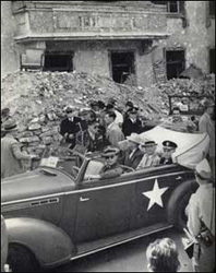 President Truman was touring Berlin with Byrnes and Leahy in July 1945. Truman is on the left in the back seat next to Byrnes and Leahy. 